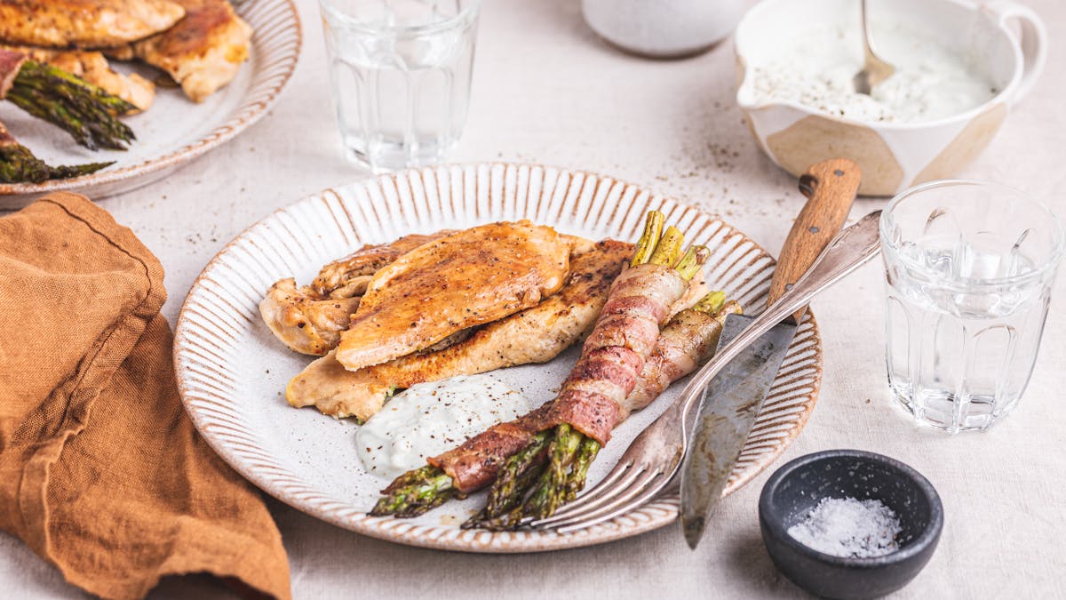 Chicken breast with bacon wrapped asparagus and blue cheese dressing