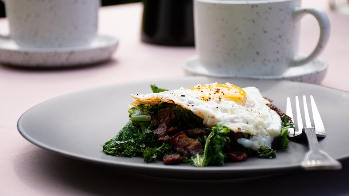 Crispy bacon, kale & fried eggs