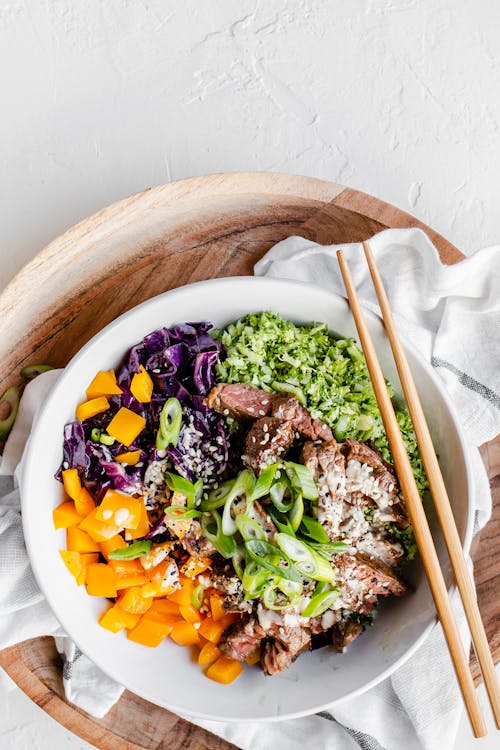 Keto beef and broccoli rice bowl with miso dressing