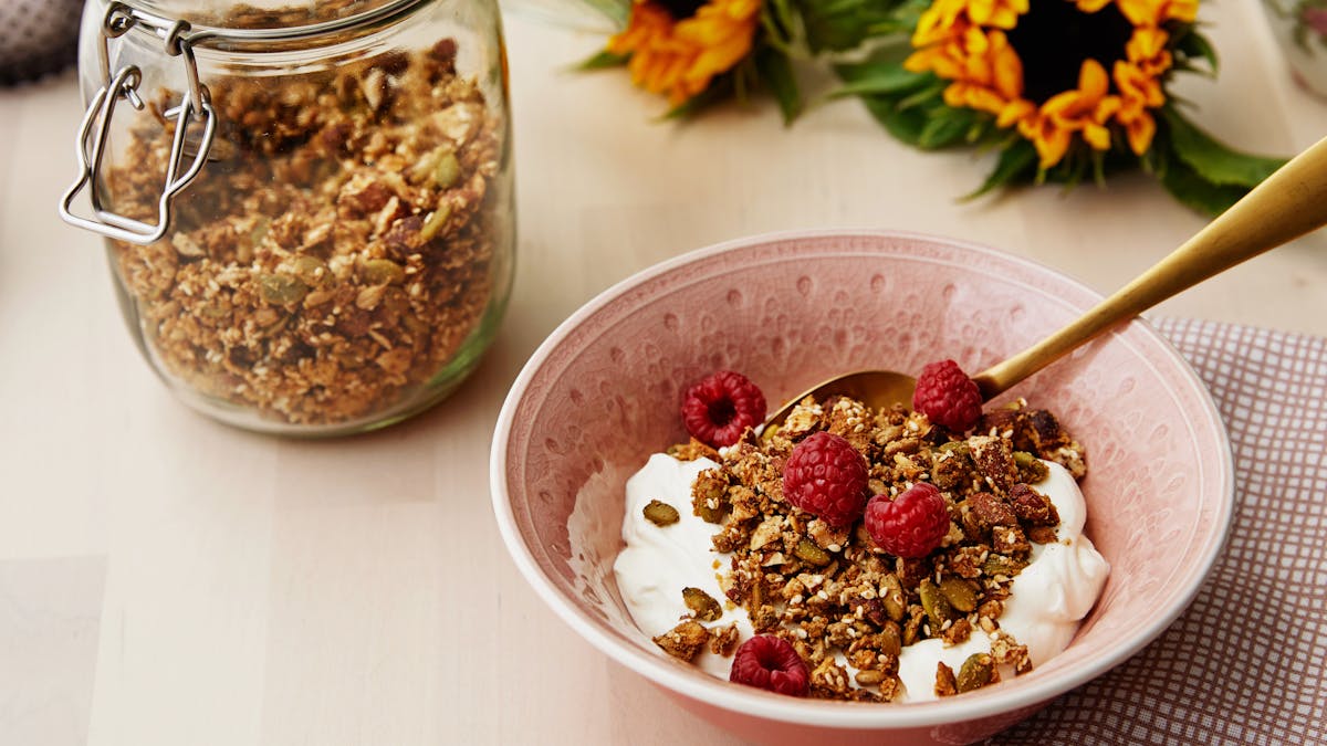 Low-carb granola with yogurt and raspberries