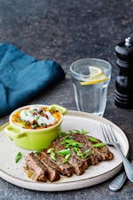 Ribeye steak with loaded cauliflower mash