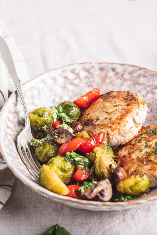 Turkey burger with roasted vegetables and garlic butter
