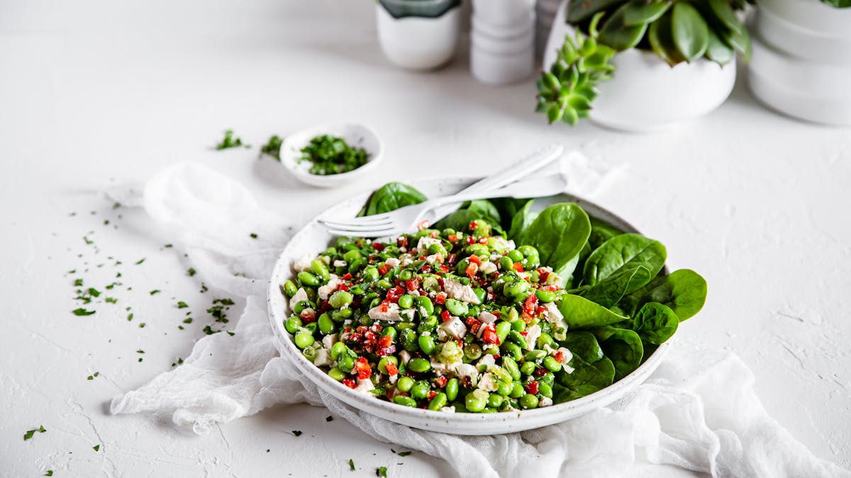 High protein vegetarian plate with edamame and feta cheese